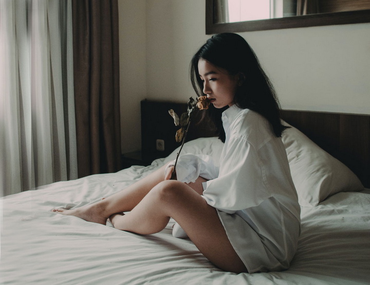 asian girl on bed